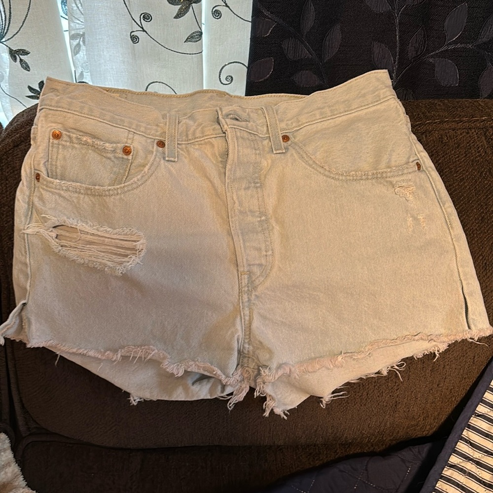Levi’s 501 Distressed Light Wash Jean Shorts with red tab